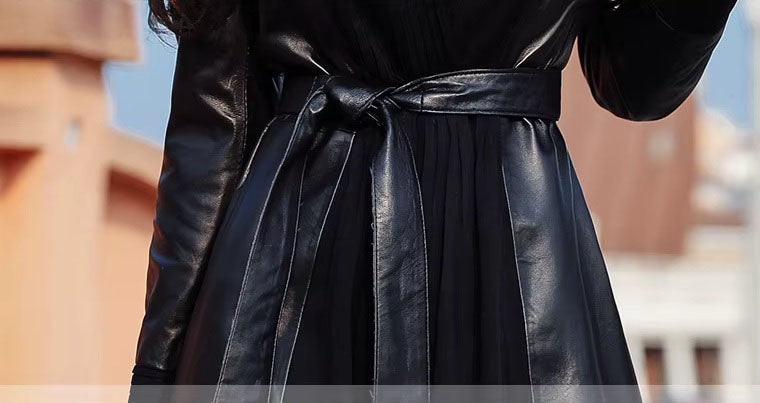 Women's Long Quilted Coat: Nightfall Embrace in Leather & Suede. Close-up of the defined waist, featuring a sculpted belt that enhances the coat’s structured elegance. Borcelleclothes.