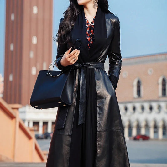 Women's Long Quilted Coat: Nightfall Embrace in Leather & Suede. Crafted from high-end genuine sheepskin with quilted suede-backed leather panels, a high wrap neckline, and a sculpted A-line silhouette. Borcelleclothes.