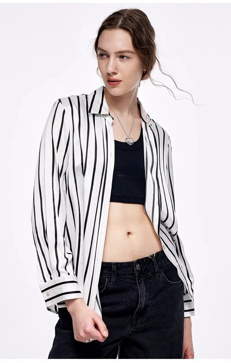 The front of the unbuttoned Women's Luxury 6A Mulberry Silk Shirt in Striped Black & White, showcasing the relaxed fit and premium silk texture. From Borcelleclothes.