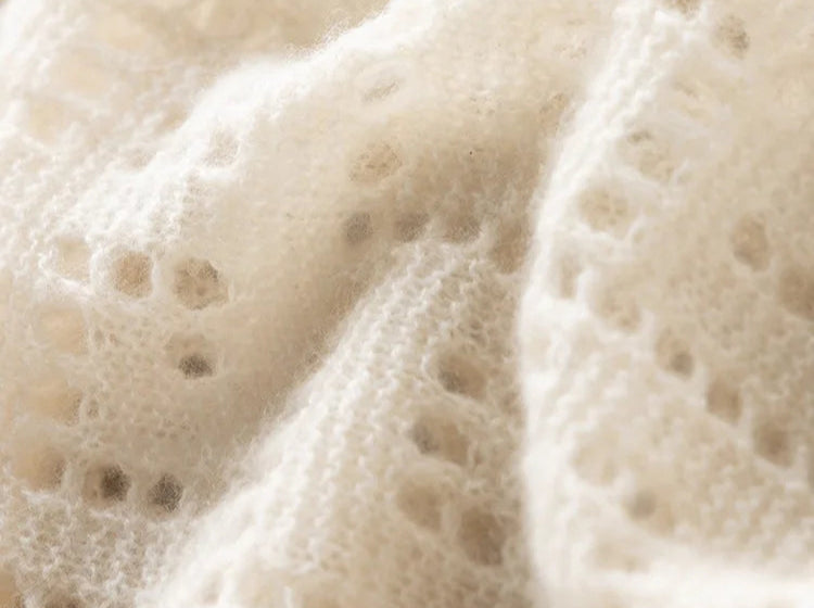 Geometric openwork texture of the Meander cashmere top in Pearl Bush – From Borcelleclothes.