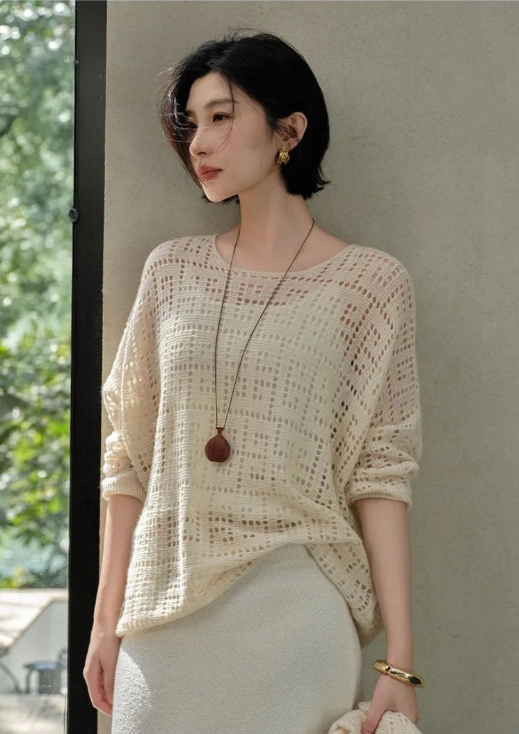 Women's openwork cashmere top in Pearl Bush, with batwing sleeves and geometric meander pattern — From Borcelleclothes.
