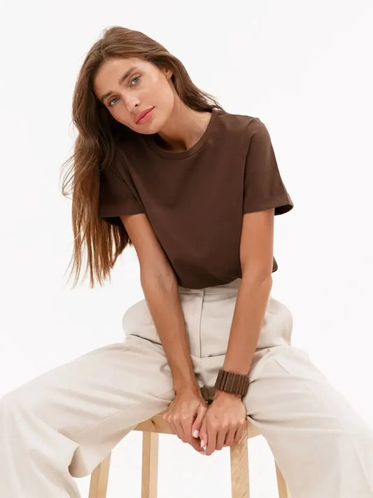 Women's Mid-Weight Cotton T-Shirt in Irish Coffee, featuring a slightly oversized fit, classic crew neck, and short sleeves. Made from cozy, mid-weight fabric, this t-shirt offers comfort and versatility, perfect for cooler days and casual styling. Available in 10 colors. From Borcelleclothes.