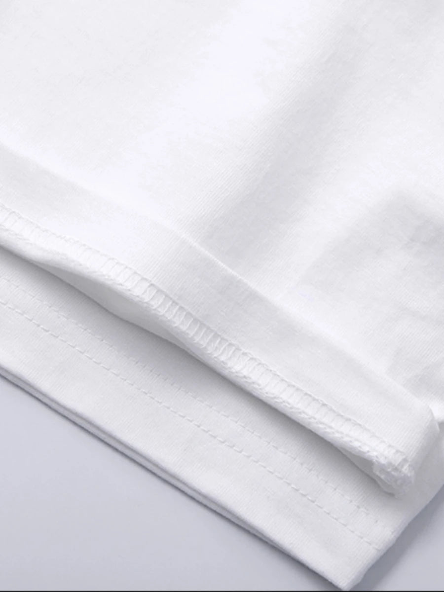 Detailed stitching on the bottom hem of Women's Mid-Weight Cotton T-Shirt in White, featuring a slightly oversized fit, classic crew neck, and short sleeves. Made from cozy, mid-weight fabric, this t-shirt offers comfort and versatility, perfect for cooler days and casual styling. Available in 10 colors. From Borcelleclothes.