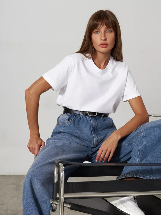 Women's Mid-Weight Cotton T-Shirt in White, featuring a slightly oversized fit, classic crew neck, and short sleeves. Made from cozy, mid-weight fabric, this t-shirt offers comfort and versatility, perfect for cooler days and casual styling. Available in 11 colors. From Borcelleclothes.