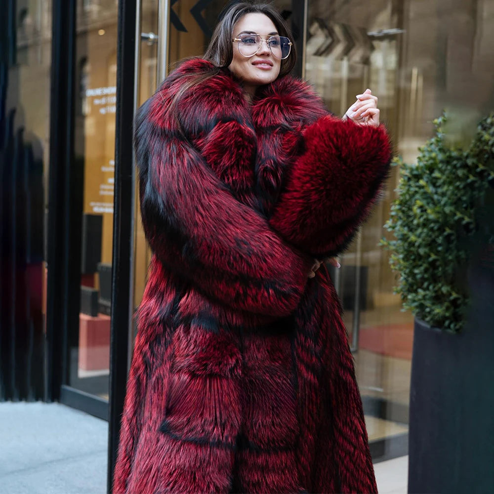 Women's Monarch Silver Fox Fur Coat in Monarch red, featuring an expanded shawl collar, mid-calf length, and voluminous silver fox fur texture, exuding confidence and presence. From Borcelleclothes.