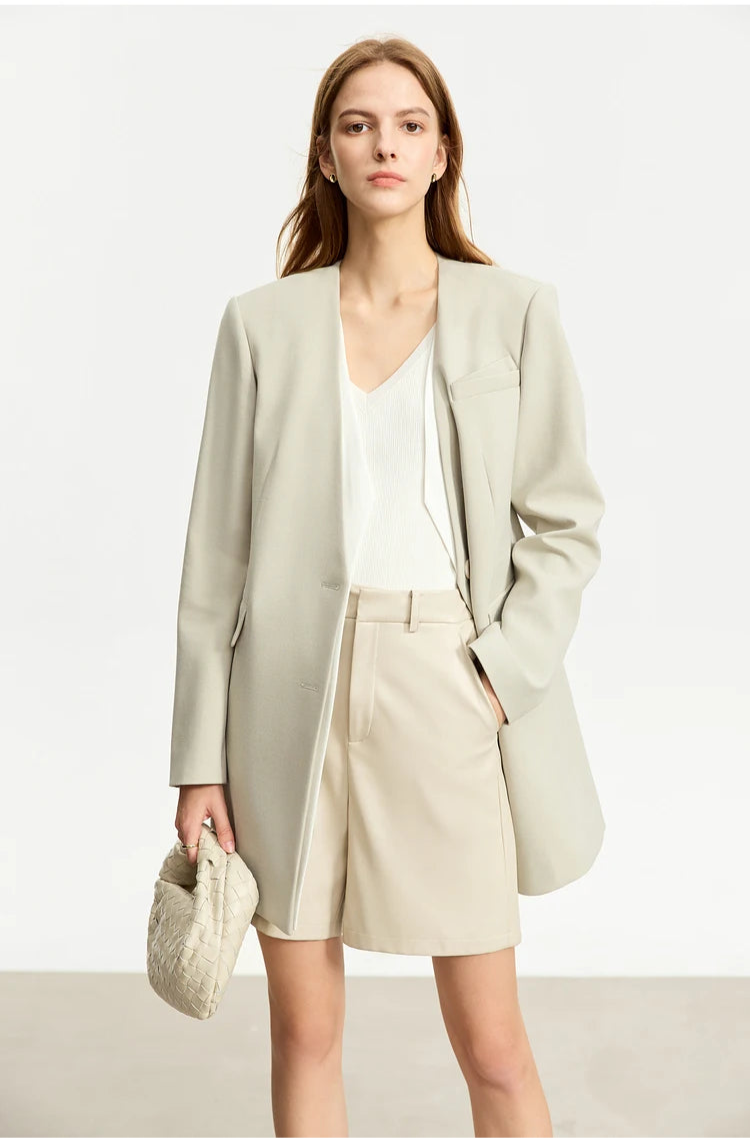 Women’s Moon Mist wrap blazer, model hand in shorts pocket – From Borcelleclothes.