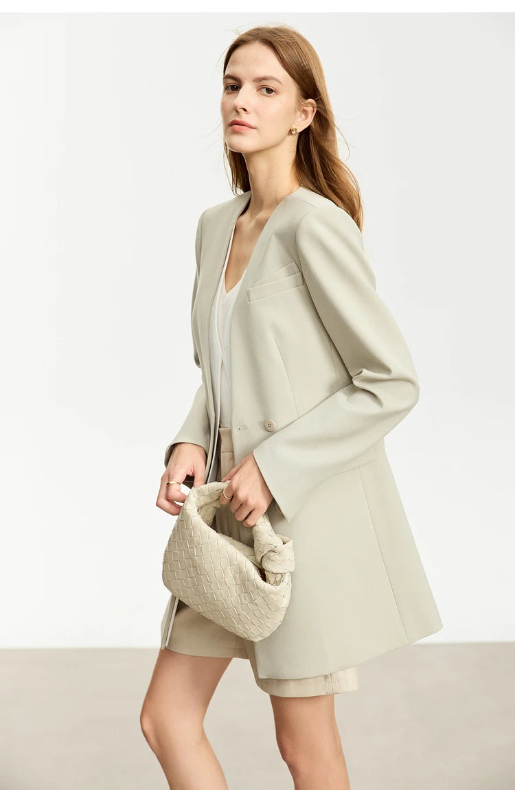 Women’s Moon Mist wrap blazer, model turned slightly to the side – From Borcelleclothes.