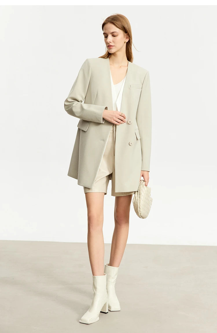 Women’s Moon Mist wrap blazer, unfastened front, model holding one side – From Borcelleclothes.