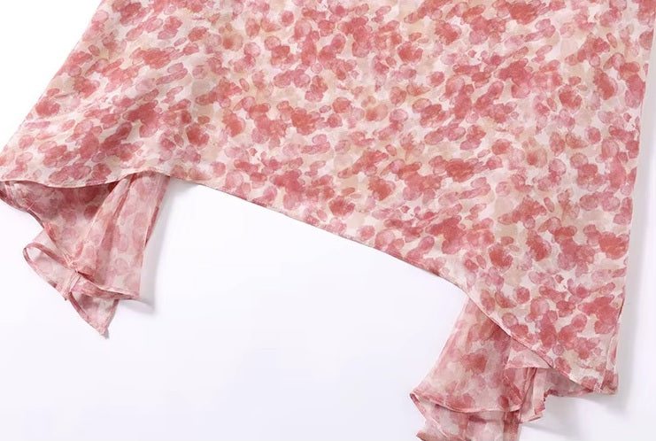 Asymmetrical hemline flowing freely, allowing chiffon to move with natural ease and soft volume. From Borcelleclothes.