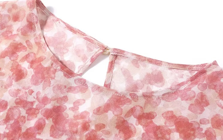 Close view of the round neckline—structured, poised, and perfectly finished in lightweight silk chiffon. From Borcelleclothes.
