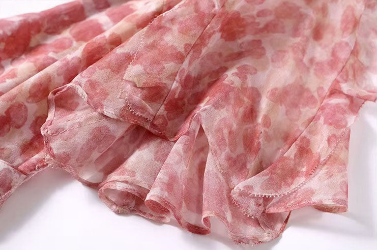 Detailed finishing of the sheer sleeve edge—refined and barely-there, completing the look with grace. From Borcelleclothes.