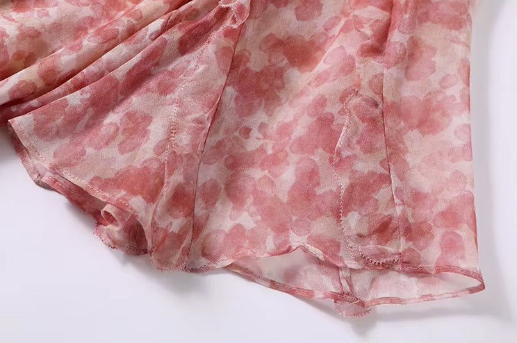 Light flounces at the sleeves—adding subtle texture and movement to the sheer, airy silhouette. From Borcelleclothes.