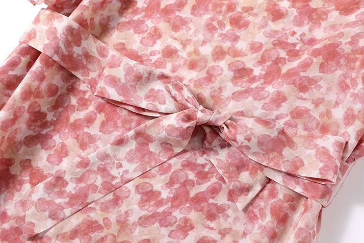 Matching silk belt tied in a bow at the waist—subtly emphasizing form without constraint. From Borcelleclothes.