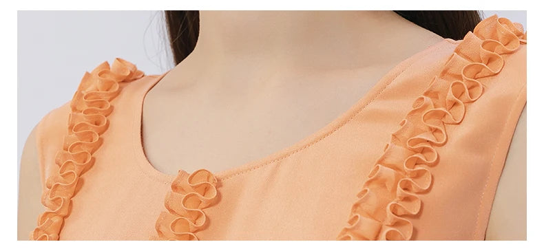 Front gathered ribbons on the dress, stitched at center. From Borcelleclothes.