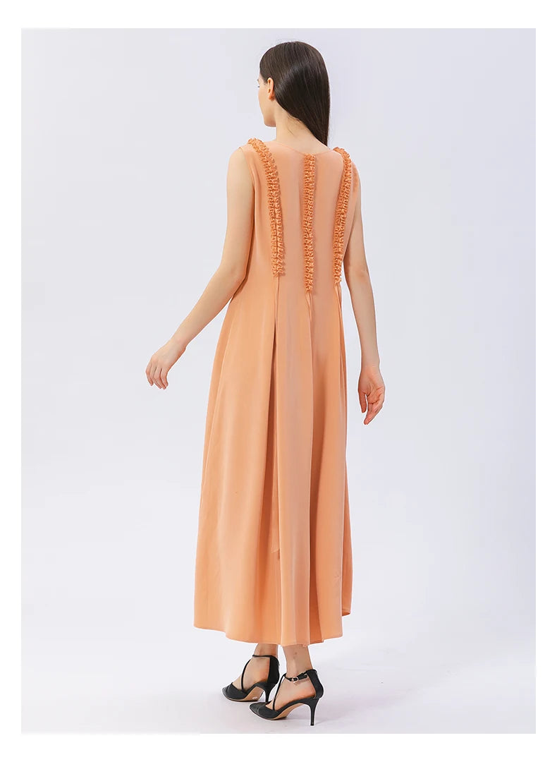 Full back view of the dress in Folklore Rose, highlighting the gathered detail. From Borcelleclothes.