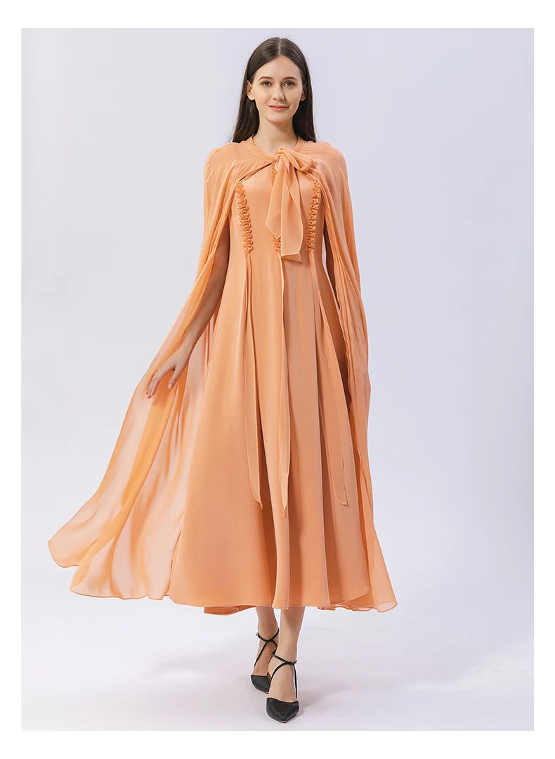 Women's mulberry silk dress and cape set in Folklore Rose shade, featuring gathered ribbon details and pintucked silk cape, made from luxurious 30 Momme silk. From Borcelleclothes.