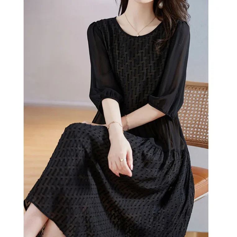 Mulberry silk georgette dress in Onyx, featuring embossed geometric texture with contrasting matte and sheen surfaces that shift with light. From Borcelleclothes.