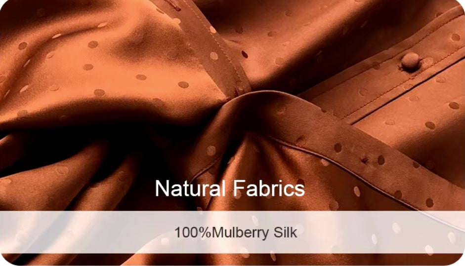 Demo of 100% Mulberry Silk jacquard fabric in Sienna showcasing  a subtle dot pattern and natural sheen.  From Borcelleclothes.