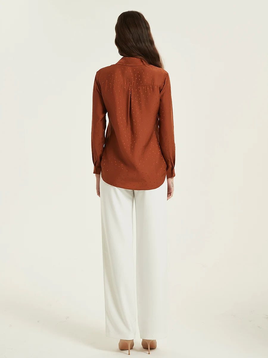 The back of the Women's Mulberry Silk Jacquard Dots Shirt in Sienna, showing the center back pleat and delicate dot pattern on the rich silk fabric. From Borcelleclothes.