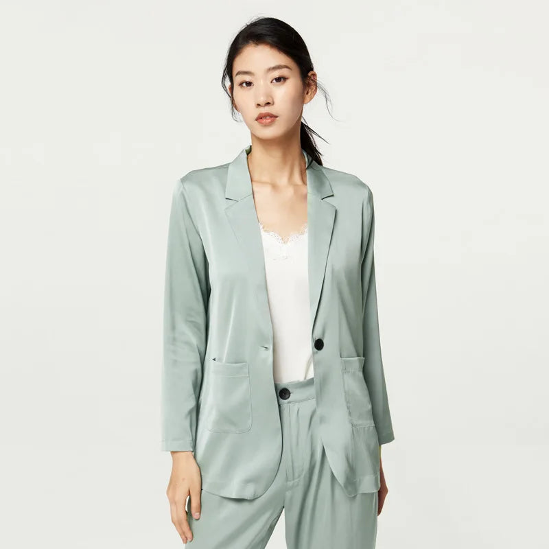 Women’s Mulberry silk satin blazer in Nebula — single-breasted with notch lapels and rounded patch pockets, cut to offer breathability, softness, and ease for warm days. From Borcelleclothes.