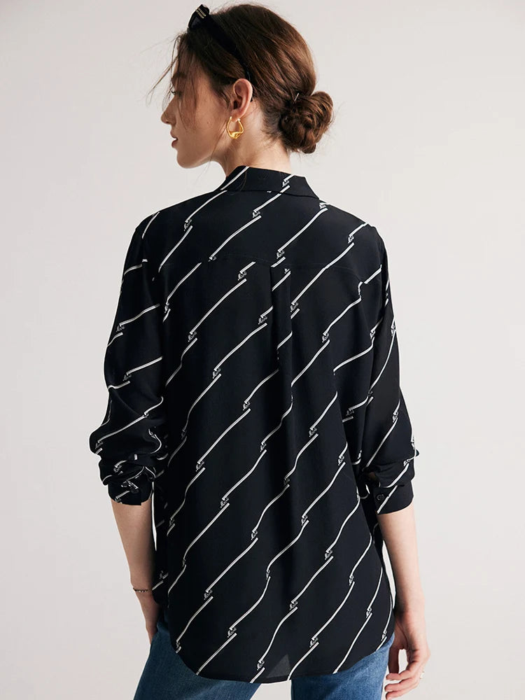 Model displaying the back design of Women's Mulberry Silk Shirt with Black and White Diagonal Stripes. From Borcelleclothes.
