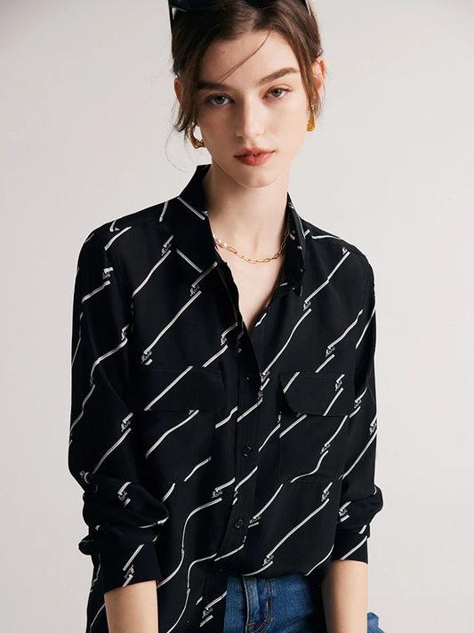 Model showcasing the front design of Women's Mulberry Silk Shirt with Black and White Diagonal Stripes. From Borcellelothes.