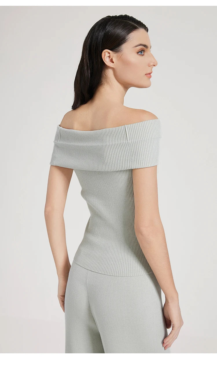 Back view of the off-the-shoulder wool-silk top in Geyser, showing ribbed texture and clean lines. From Borcelleclothes.