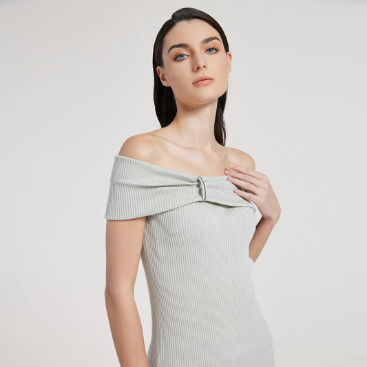 Off-the-shoulder women’s top in Geyser color made from fine ribbed wool and silk, featuring a gathered overlay with rhinestone fringe above the bust. From Borcelleclothes.