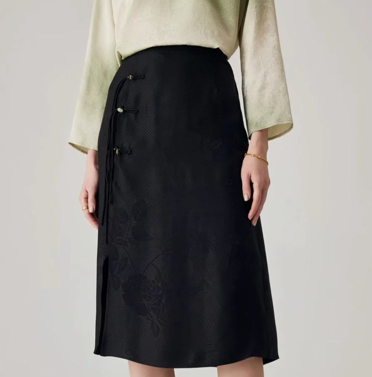 Full-length view of the skirt with model standing straight, arms at sides. From Borcelleclothes.