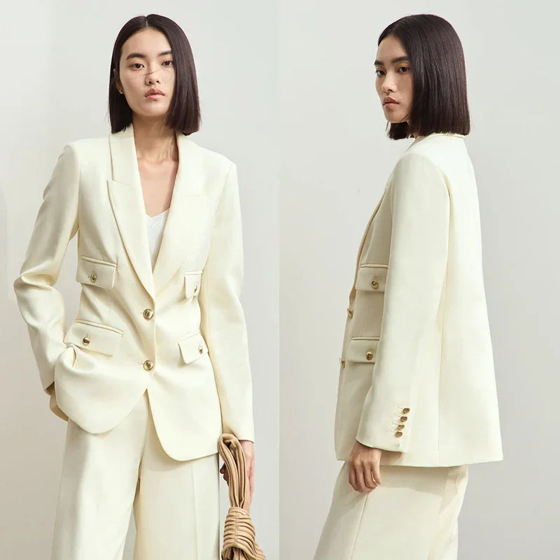 Sugar Cane blazer shown from the front and side on model — light, neutral clarity in a balanced, waist-shaped silhouette. From Borcelleclothes.
