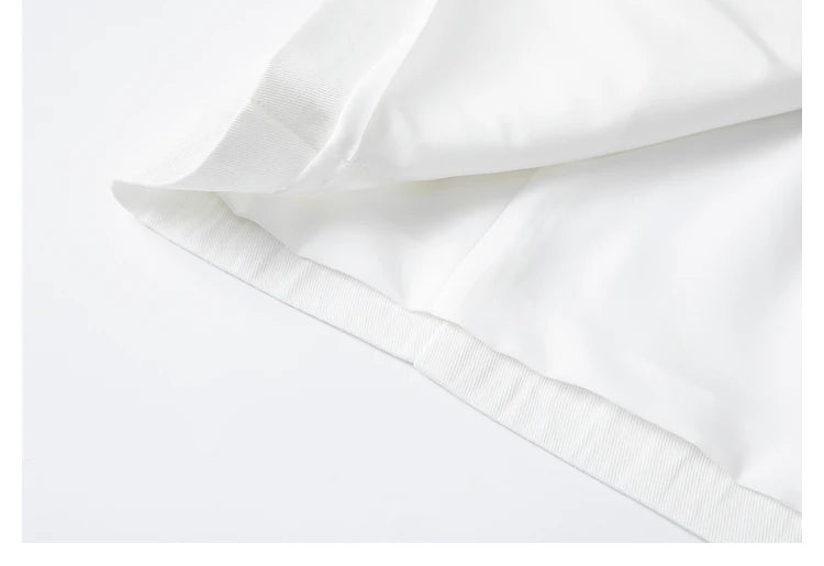 Unfolded bottom hem of the Platinum Urban Blazer. From Borcelleclothes.