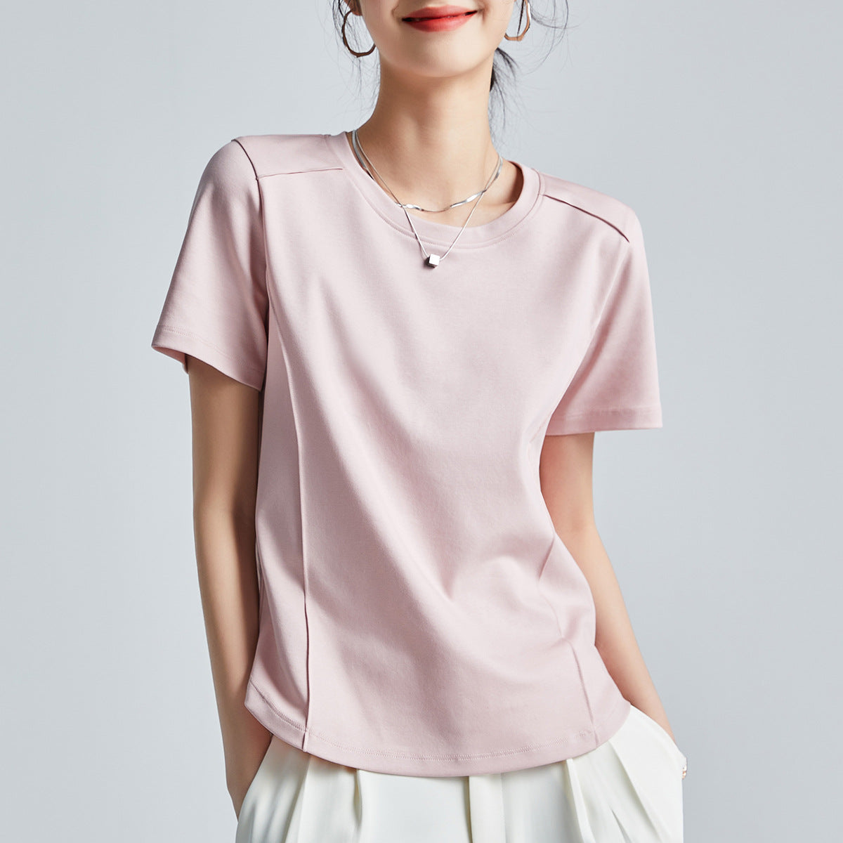 Women's Premium Mercerized Cotton T-Shirt in Lavender Pinocchio, featuring a classic crew neck design, short sleeves, and vertical pintucks for a slimming effect. Crafted from high-quality mercerized cotton for a smooth, soft feel with a subtle sheen. From Borcelleclothes.