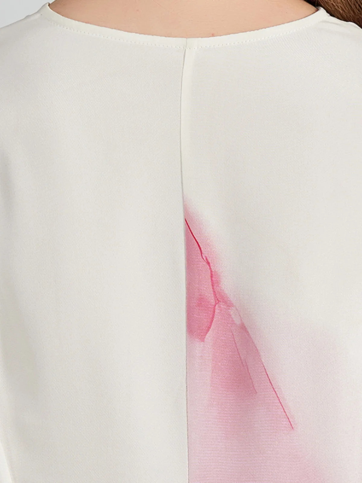 Back view of the upper part of the dress, showing the clean finish and structured seams. From Borcelleclothes.