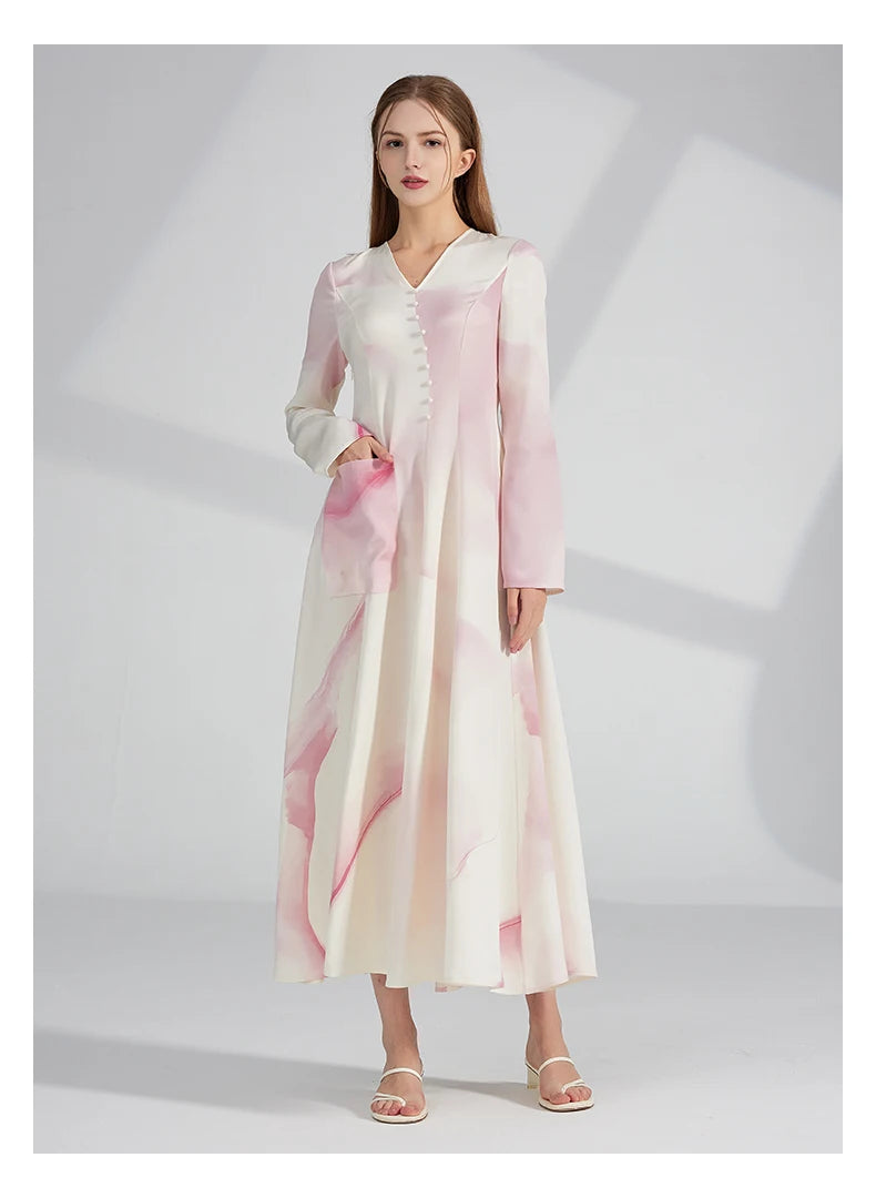 Model resting a hand inside the visible side pocket of the dress. From Borcelleclothes.