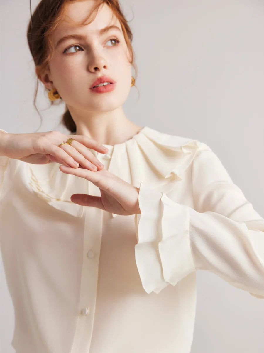 Model wearing the Women's Romantic Pearl Bush Silk Blouse, showcasing the double-layered flounce cuffs in luxurious 6A Grade Mulberry Silk. From Borcelleclothes.