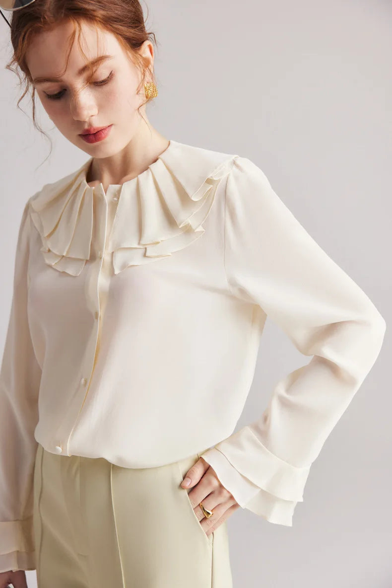 Model wearing the Women's Romantic Pearl Bush Silk Blouse, watches down to showcase the vintage-inspired double pilgrim collar. From Borcelleclothes.