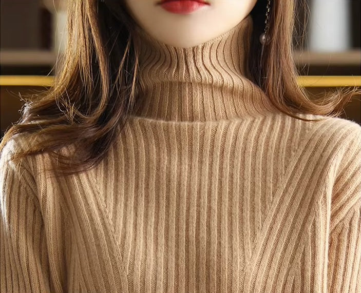 The upper part of the women's Sculpted Wool Set in Light Taupe, featuring the ribbed high neck and tailored chest design, Borcelleclothes.