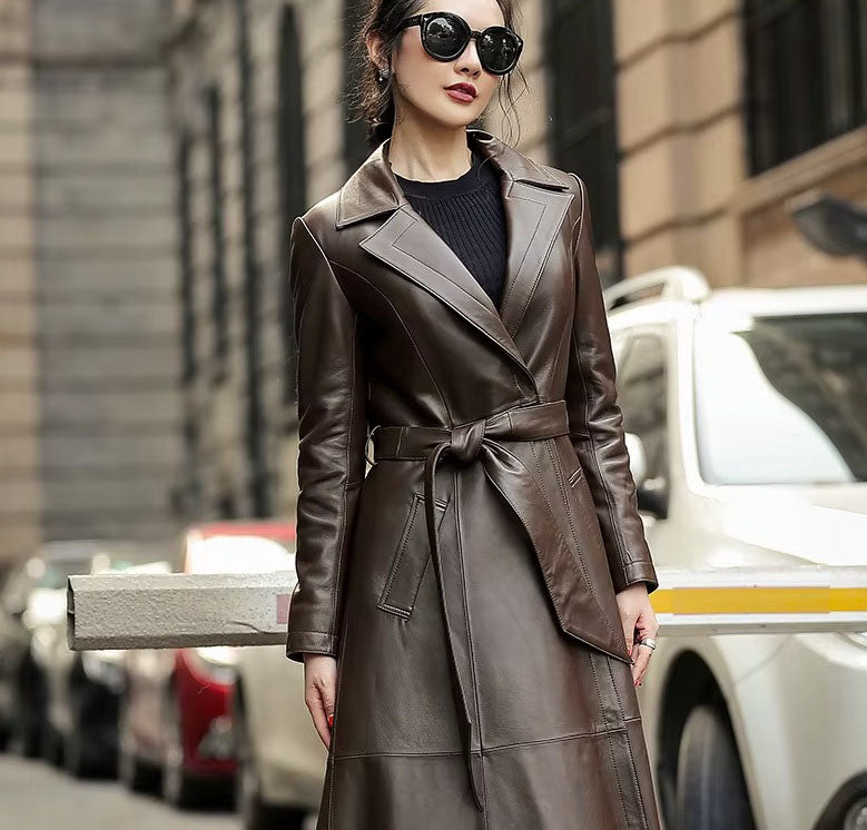 Women's Sheepskin Down Coat in Eclipse, worn without the fur collar for a minimalist, tailored look. Borcelleclothes.