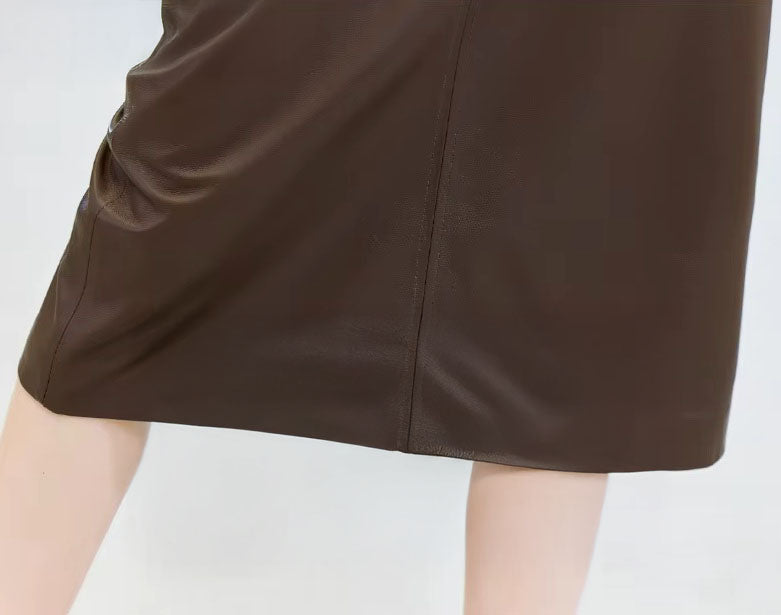 Bottom section of the Dark Rum leather skirt — mid-calf length and clean hemline in structured, genuine sheepskin. From Borcelleclothes.