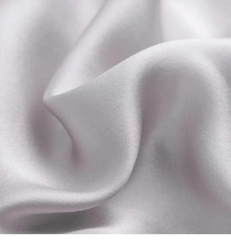 Inner silk crepe lining in Lavender Grey, matte and slightly shorter than outer layer. From Borcelleclothes.