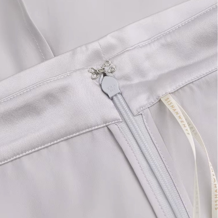 Zipper closure on side of skirt, shown from the inner side with subtle stitching. From Borcelleclothes.