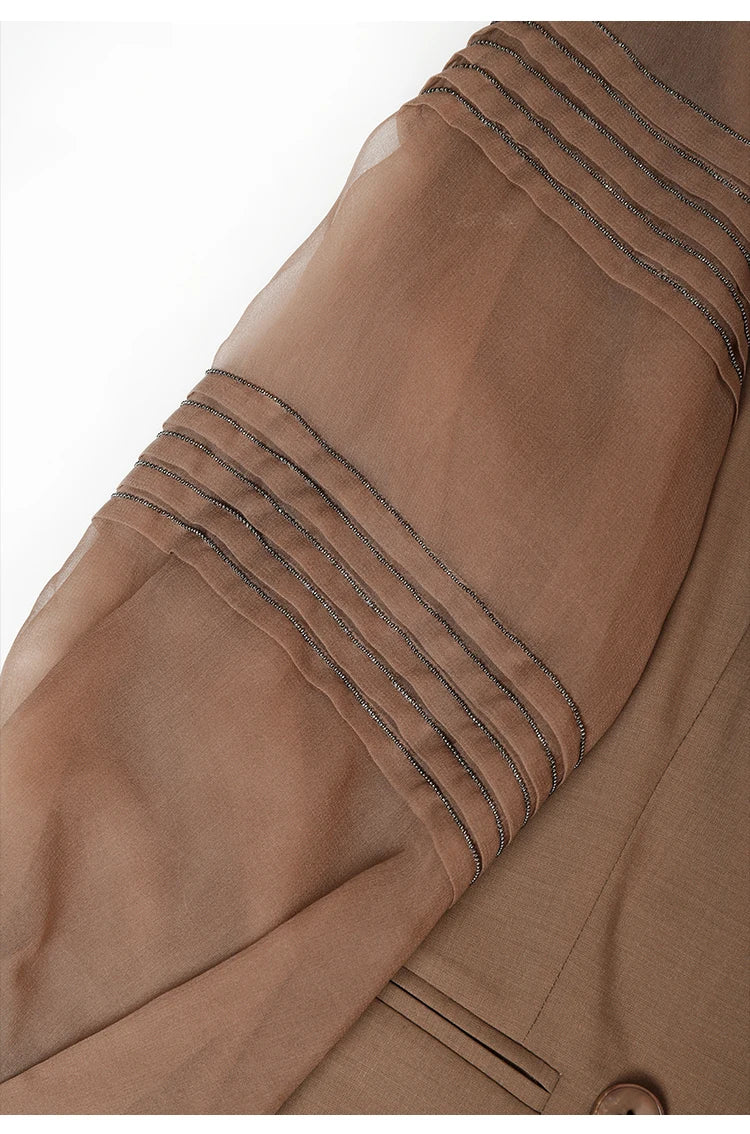 Sheer sleeve with rhinestone pleats on women’s wool blazer in Milk Chocolate. From Borcelleclothes.