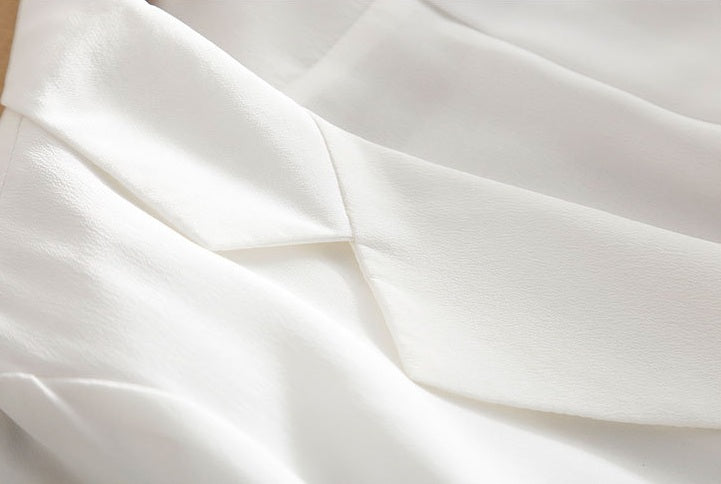 Detail of the Romance blazer’s notch lapel — clean lines and soft structure in mulberry silk crepe de chine. From Borcelleclothes.