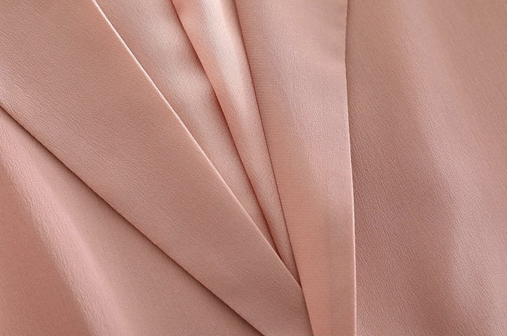 Rose Fog blazer lapels — understated structure in a romantic, barely-there hue. From Borcelleclothes.