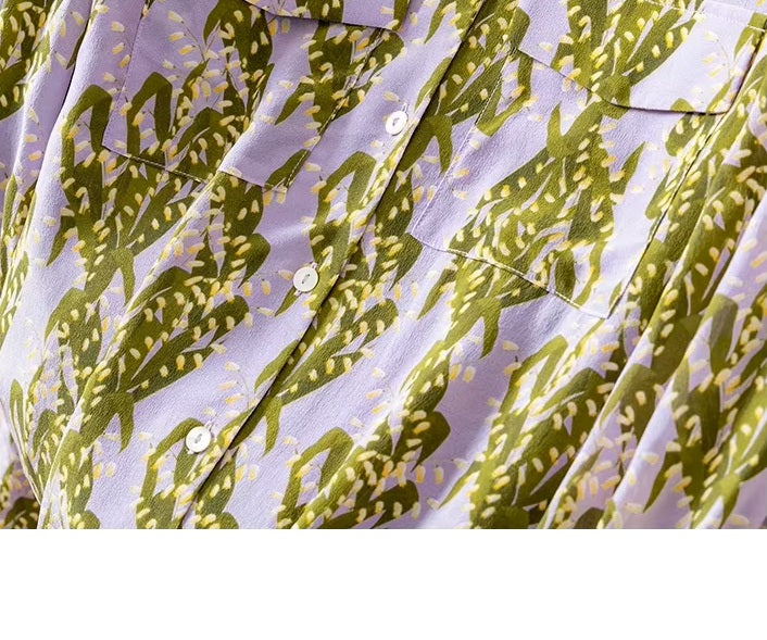 Pastel floral silk shirt with visible flap pockets. From Borcelleclothes.