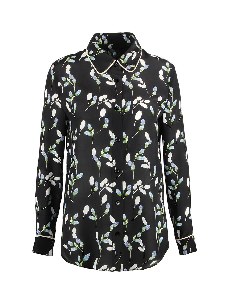 Draped women's silk shirt with berry-inspired print, highlighting the fluid movement and luxurious texture of the fabric. From Borcelleclothes.