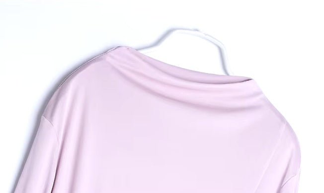 Draping detail of the high straight neckline on Women's Silk Top with Casing in Amour. From Borcelleclothes.