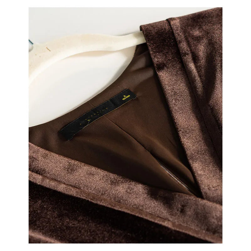Detailed stitching and textured fabric on the collar of a Women's Silk Velvet Blouse in Coffee Bean with corset-inspired sculpted waist, featuring long sleeves, V-neckline, and luxurious texture. From Borcelleclothes.