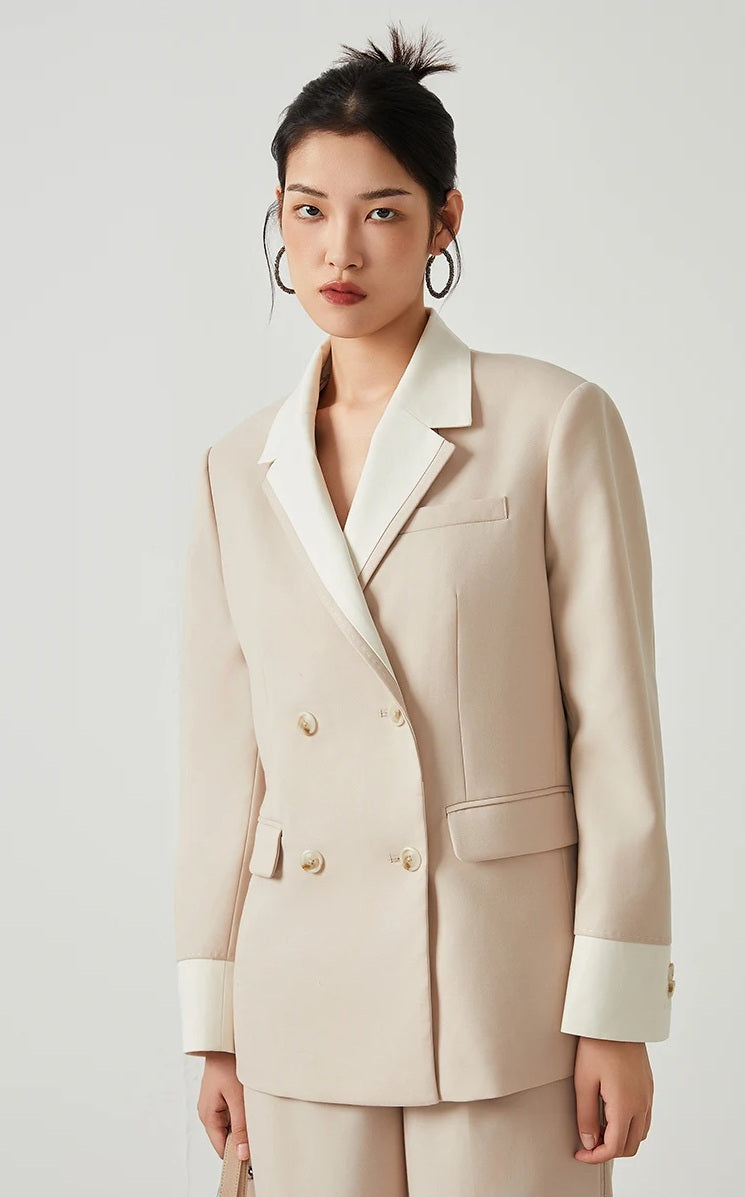 Front view of model wearing women’s Silver Pink & Davy Grey blazer in Silver Pink, arms straight — From Borcelleclothes.