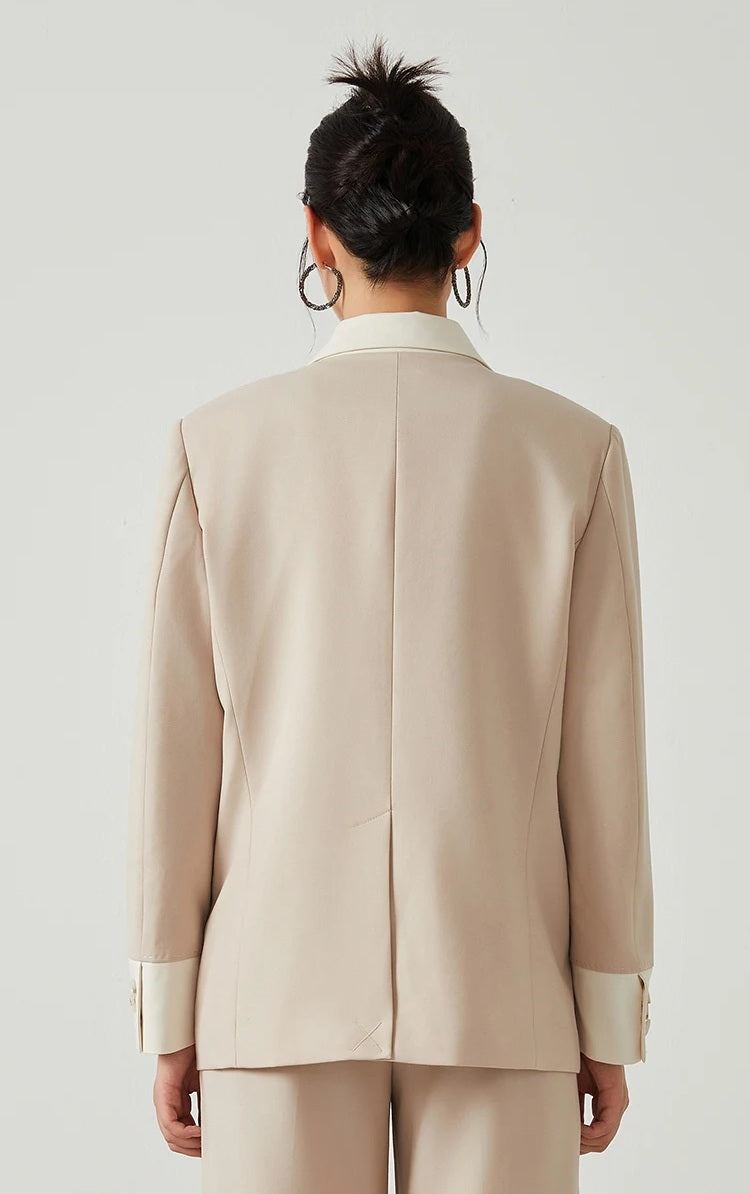 Back view of model wearing women’s Silver Pink & Davy Grey blazer in Silver Pink — From Borcelleclothes.